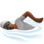 person swimming: medium-dark skin tone on Apple