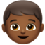 boy: medium-dark skin tone on Apple