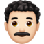 man: light skin tone, curly hair on Apple