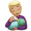 man feeding baby: medium-light skin tone on Apple