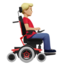 man in motorized wheelchair facing right: medium-light skin tone on Apple