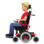 man in motorized wheelchair: medium-light skin tone on Apple