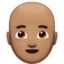 man: medium skin tone, bald on Apple