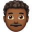 man: medium-dark skin tone, curly hair on Apple