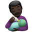man feeding baby: dark skin tone on Apple