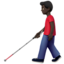 man with white cane: dark skin tone on Apple