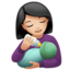 woman feeding baby: light skin tone on Apple