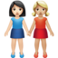 women holding hands: light skin tone, medium-light skin tone on Apple