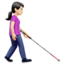 woman with white cane facing right: light skin tone on Apple