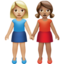 women holding hands: medium-light skin tone, medium skin tone on Apple