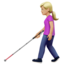 woman with white cane: medium-light skin tone on Apple
