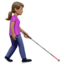 woman with white cane facing right: medium skin tone on Apple