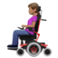 woman in motorized wheelchair: medium skin tone on Apple