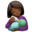woman feeding baby: medium-dark skin tone on Apple