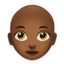 woman: medium-dark skin tone, bald on Apple