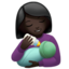 woman feeding baby: dark skin tone on Apple