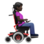 woman in motorized wheelchair facing right: dark skin tone on Apple