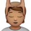 person getting massage: medium skin tone on Apple