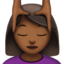 woman getting massage: medium-dark skin tone on Apple