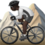 person mountain biking: dark skin tone on Apple