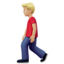 man walking: medium-light skin tone on Apple