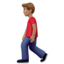 man walking: medium skin tone on Apple