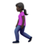woman walking: dark skin tone on Apple