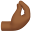 pinched fingers: medium-dark skin tone on Apple