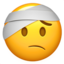 face with head-bandage on Apple