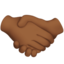 handshake: medium-dark skin tone on Apple