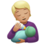 person feeding baby: medium-light skin tone on Apple