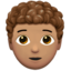 person: medium skin tone, curly hair on Apple