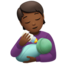 person feeding baby: medium-dark skin tone on Apple