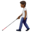 person with white cane: medium-dark skin tone on Apple