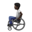 person in manual wheelchair: dark skin tone on Apple