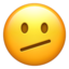 face with diagonal mouth on Apple