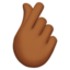 hand with index finger and thumb crossed: medium-dark skin tone on Apple