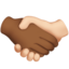 handshake: medium-dark skin tone, light skin tone on Apple