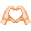 heart hands: light skin tone on Apple