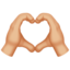 heart hands: medium-light skin tone on Apple