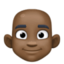 man: dark skin tone, bald on Facebook