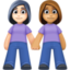 women holding hands: light skin tone, medium skin tone on Facebook