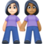 women holding hands: light skin tone, medium-dark skin tone on Facebook
