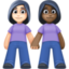 women holding hands: light skin tone, dark skin tone on Facebook
