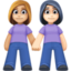 women holding hands: medium-light skin tone, light skin tone on Facebook