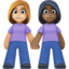 women holding hands: medium-light skin tone, dark skin tone on Facebook