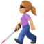 woman with white cane: medium-light skin tone on Facebook