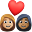 couple with heart: woman, woman, medium-light skin tone, medium-dark skin tone on Facebook