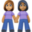 women holding hands: medium skin tone, medium-dark skin tone on Facebook