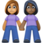 women holding hands: medium skin tone, dark skin tone on Facebook